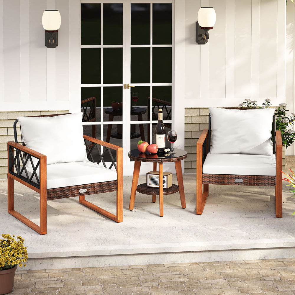 Two acacia wood chairs with off-white cushions and a tempered glass top table, perfect for outdoor relaxation.