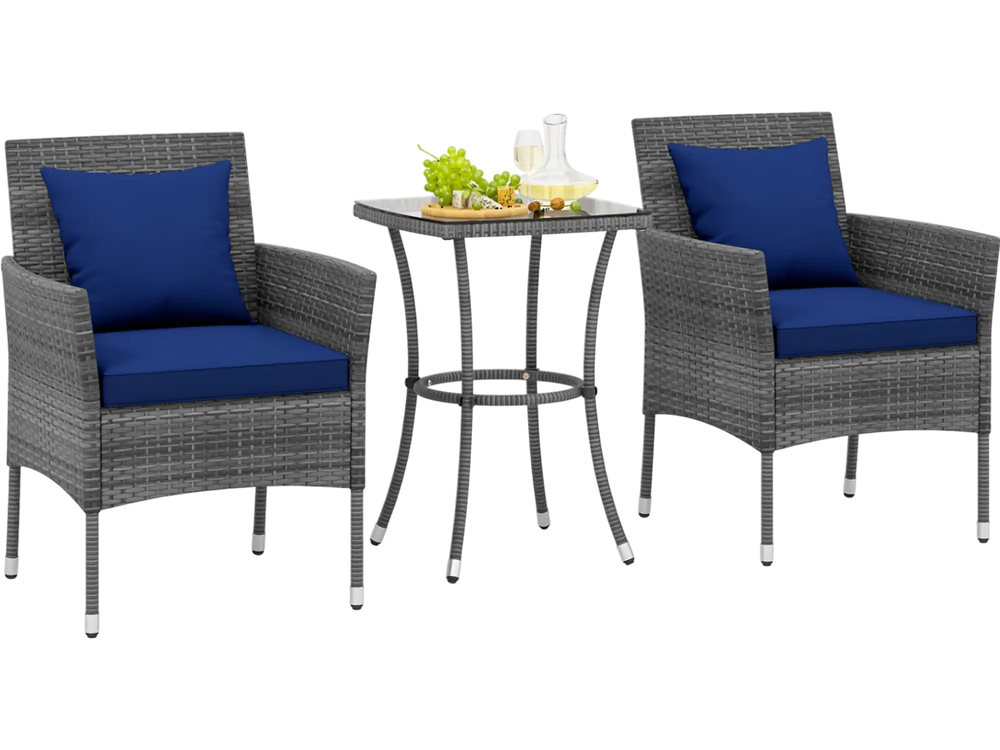 Cushioned patio chairs with navy covers and a tempered glass coffee table, perfect for outdoor relaxation.