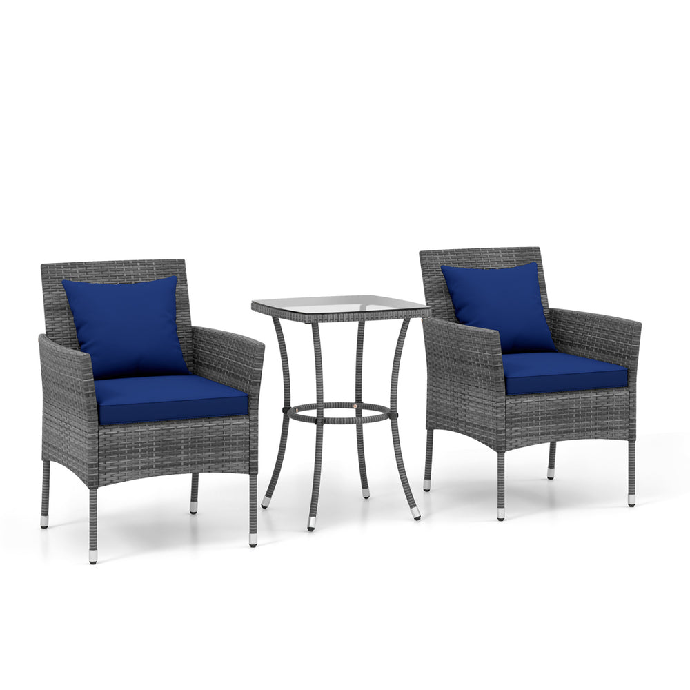 Cushioned patio chairs with navy cushions and tempered glass coffee table in a 3-piece outdoor furniture set.