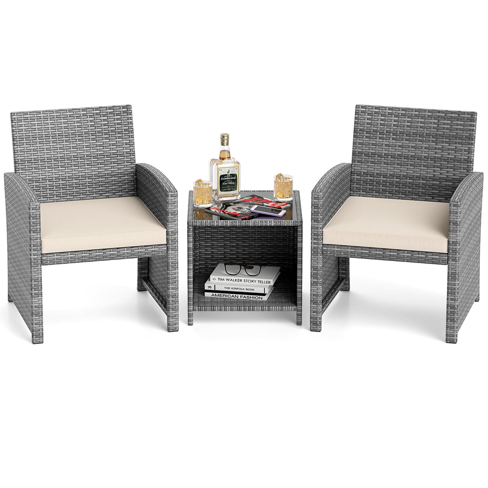 Two gray PE rattan chairs with soft seat cushions and a tempered glass coffee table, perfect for patio relaxation.
