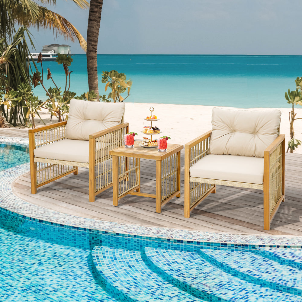 Two beige cushioned chairs and a coffee table from a 3-piece patio set, perfect for outdoor relaxation by the pool.