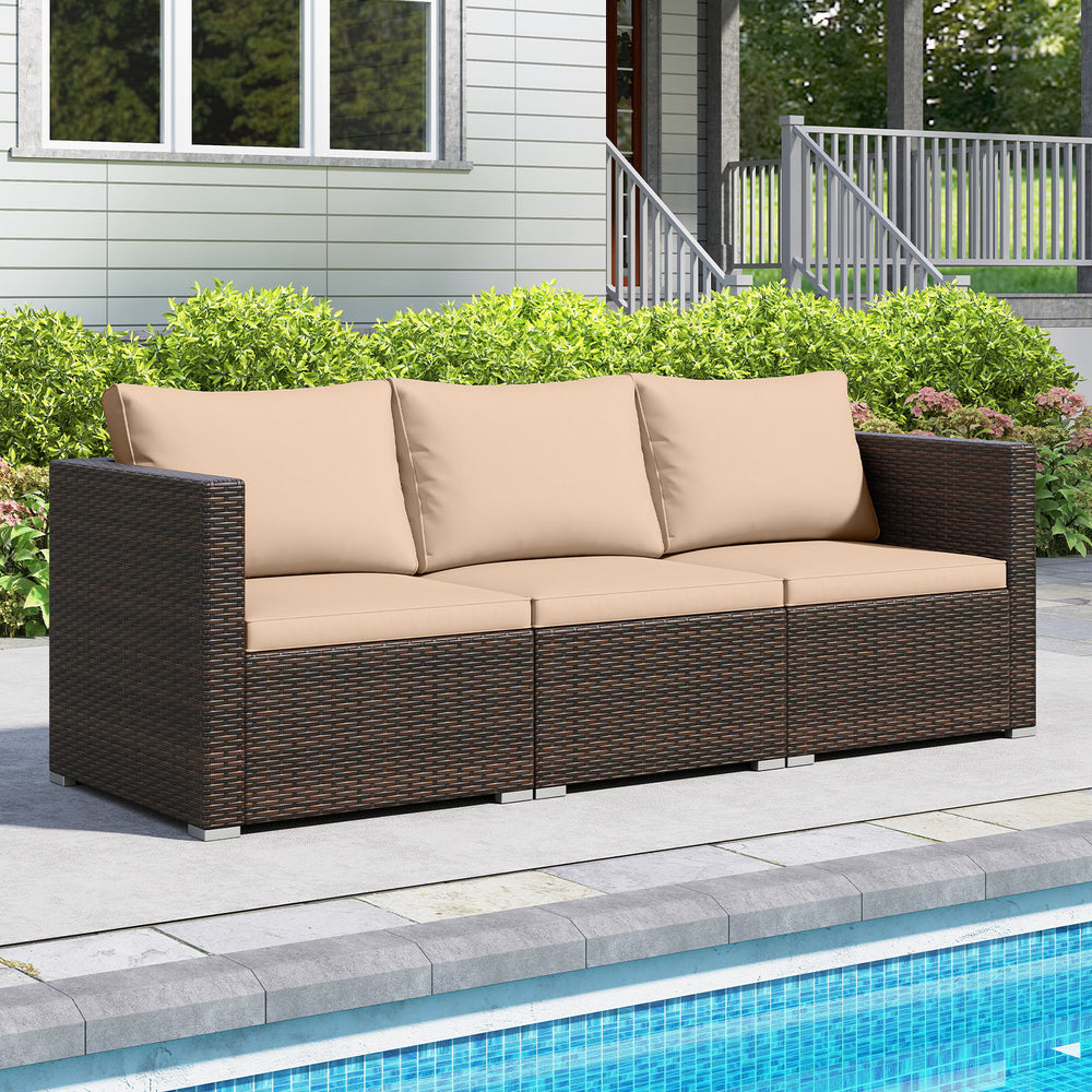 Three-piece patio sectional sofa set with beige cushions, made of durable PE rattan, ideal for poolside relaxation.