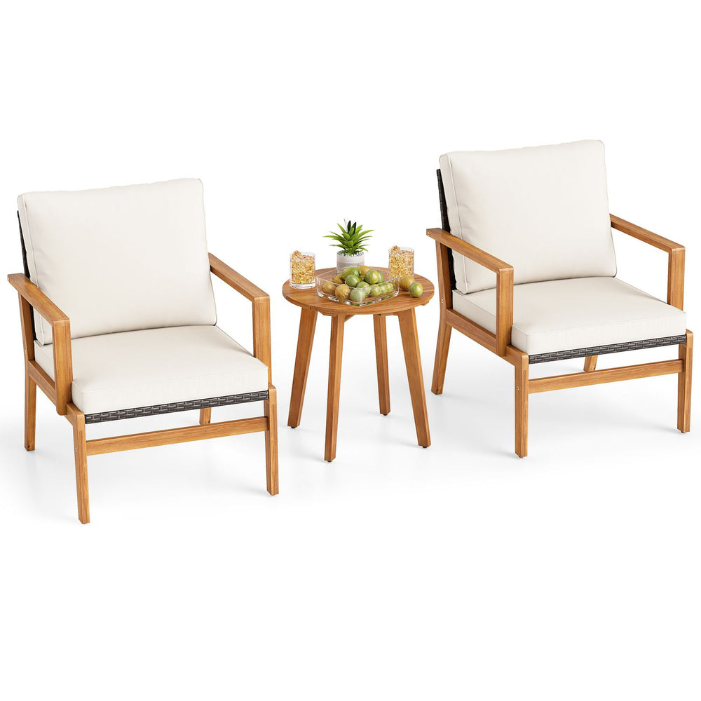 Two acacia wood chairs with off-white cushions and a matching side table, perfect for patio or garden relaxation.