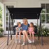 Three-seat patio swing chair on a deck, featuring a sun-protective adjustable canopy and breathable mesh for relaxation.