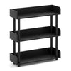 Black 3-tier bookshelf with anti-tipping kit, ideal for living room storage and organization of books and decor.