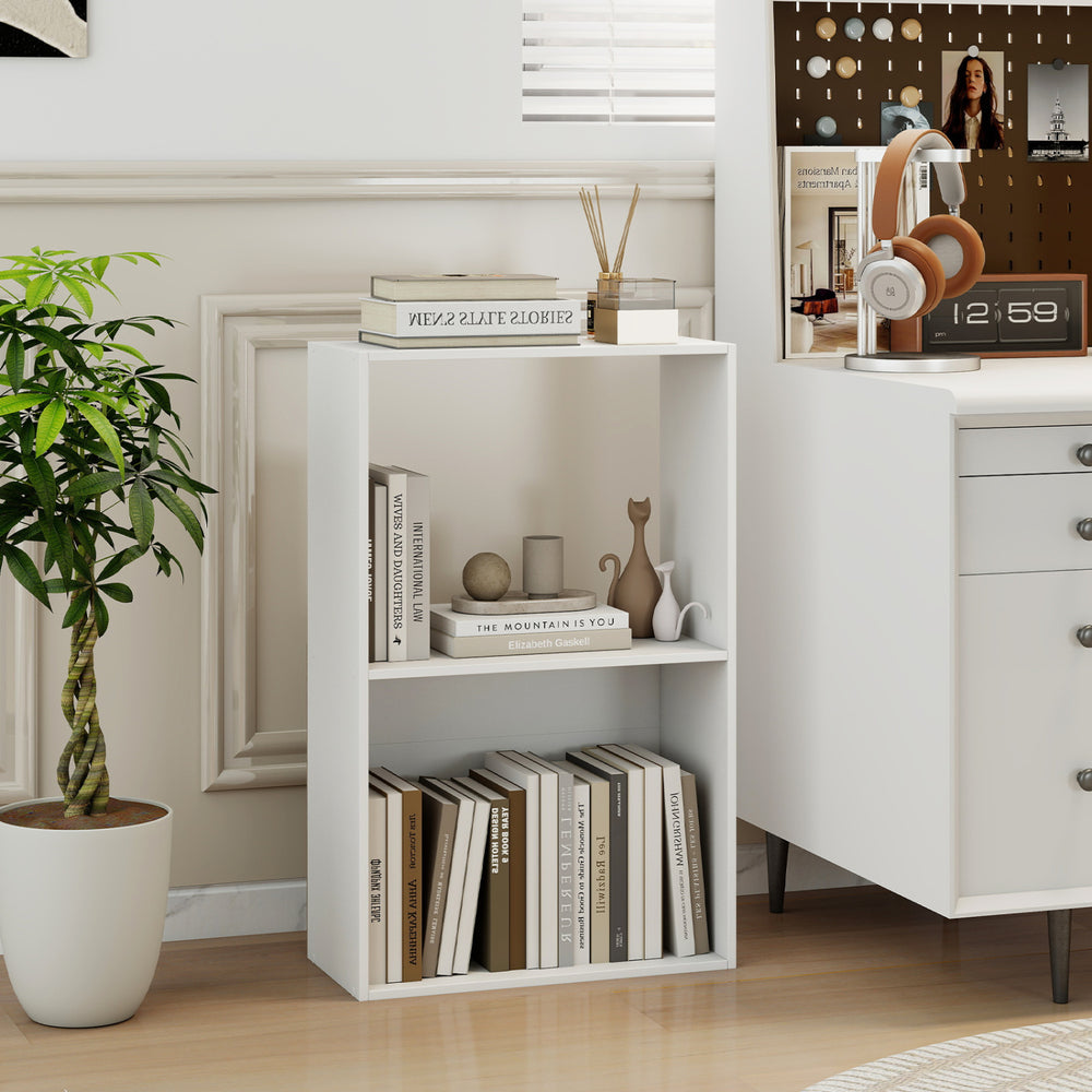 3-tier white bookshelf with open storage compartment, ideal for organizing books and decorations in any room.