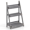 Four-tier foldable plant stand made of fir wood with slatted shelves, ideal for displaying plants in any space.