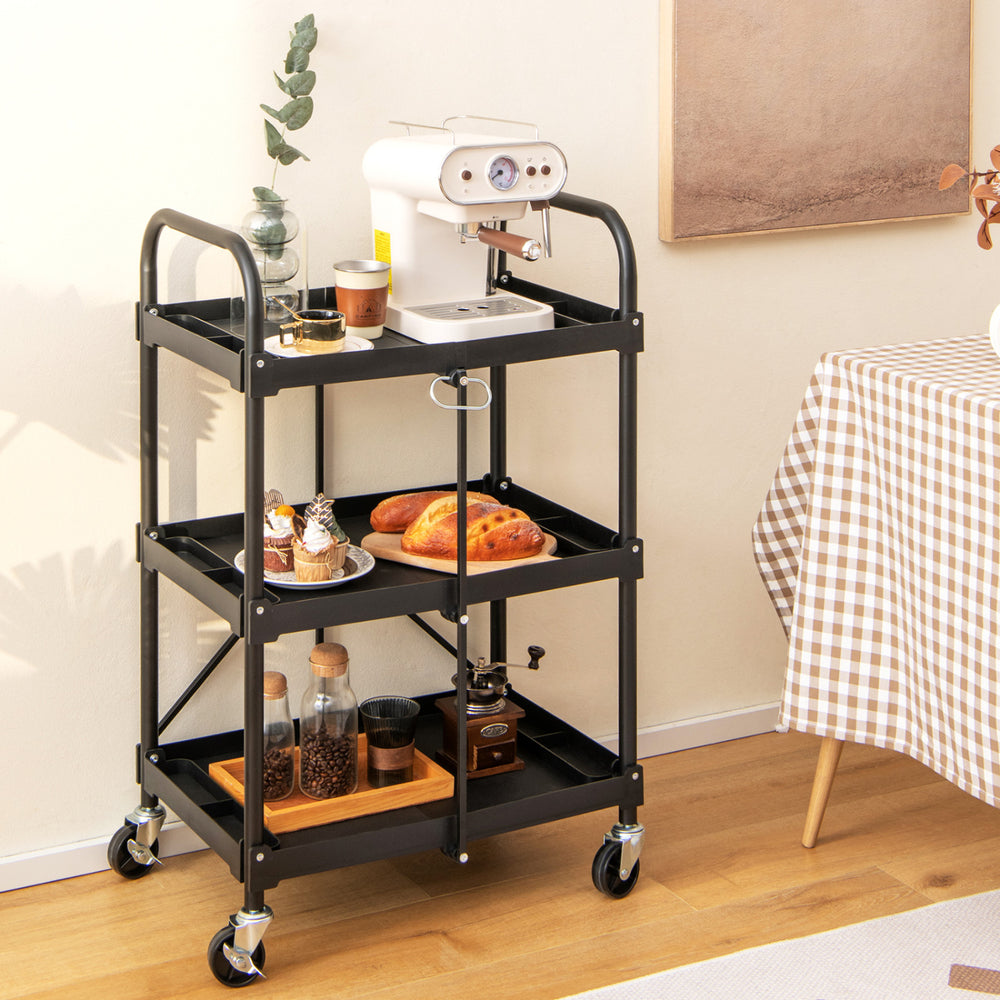 3-tier black folding trolley cart with universal wheels, ideal for organizing tools and groceries in kitchens or workshops.
