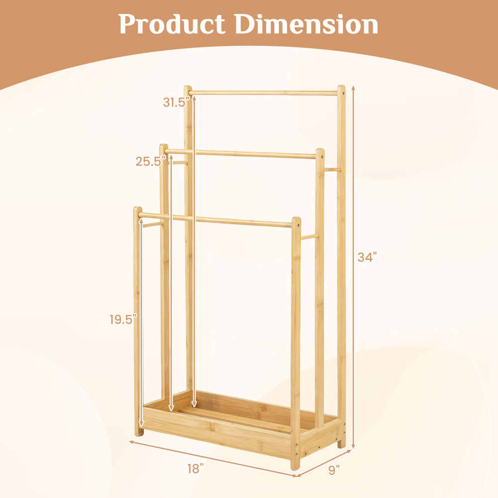 3-tier free standing bamboo towel rack with a natural finish, featuring ample hanging space and a raised storage shelf.
