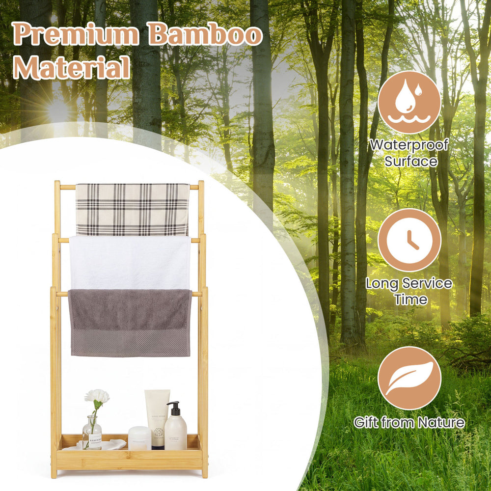 Three-tier free-standing bamboo towel rack with storage shelf, featuring a waterproof surface for easy cleaning.