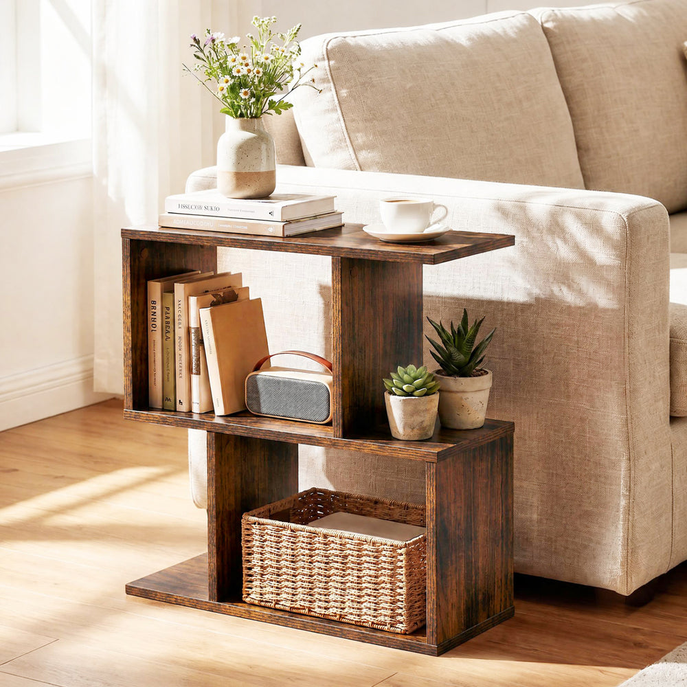 Freestanding 3-tier geometric bookshelf in brown, perfect as a side table or display shelf for books and plants.