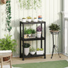 3-tier heavy-duty plastic storage shelves in black, featuring plants and pots, ideal for garage or indoor use.
