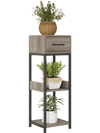 Tall 3-tier plant stand in gray with drawer, featuring open shelves for plants and anti-tipping devices for safety.
