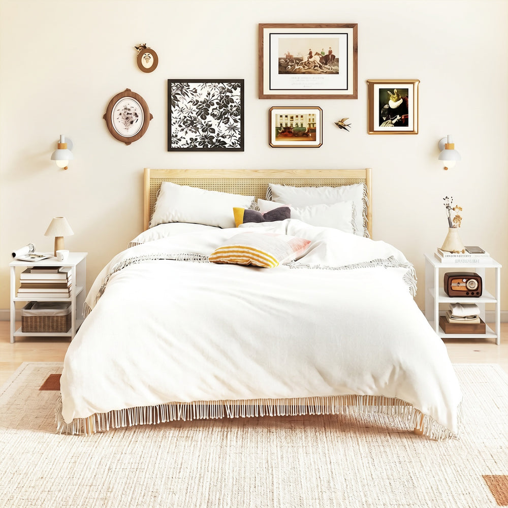 Modern white nightstand with three open shelves, perfect for compact spaces and easy access in a bedroom setting.
