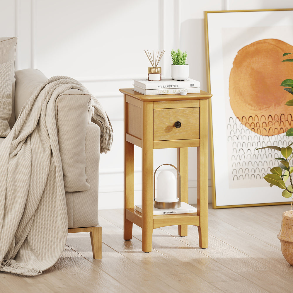 Natural 3-tier nightstand with drawer and open shelf, perfect for cozy living room or bedroom corners.