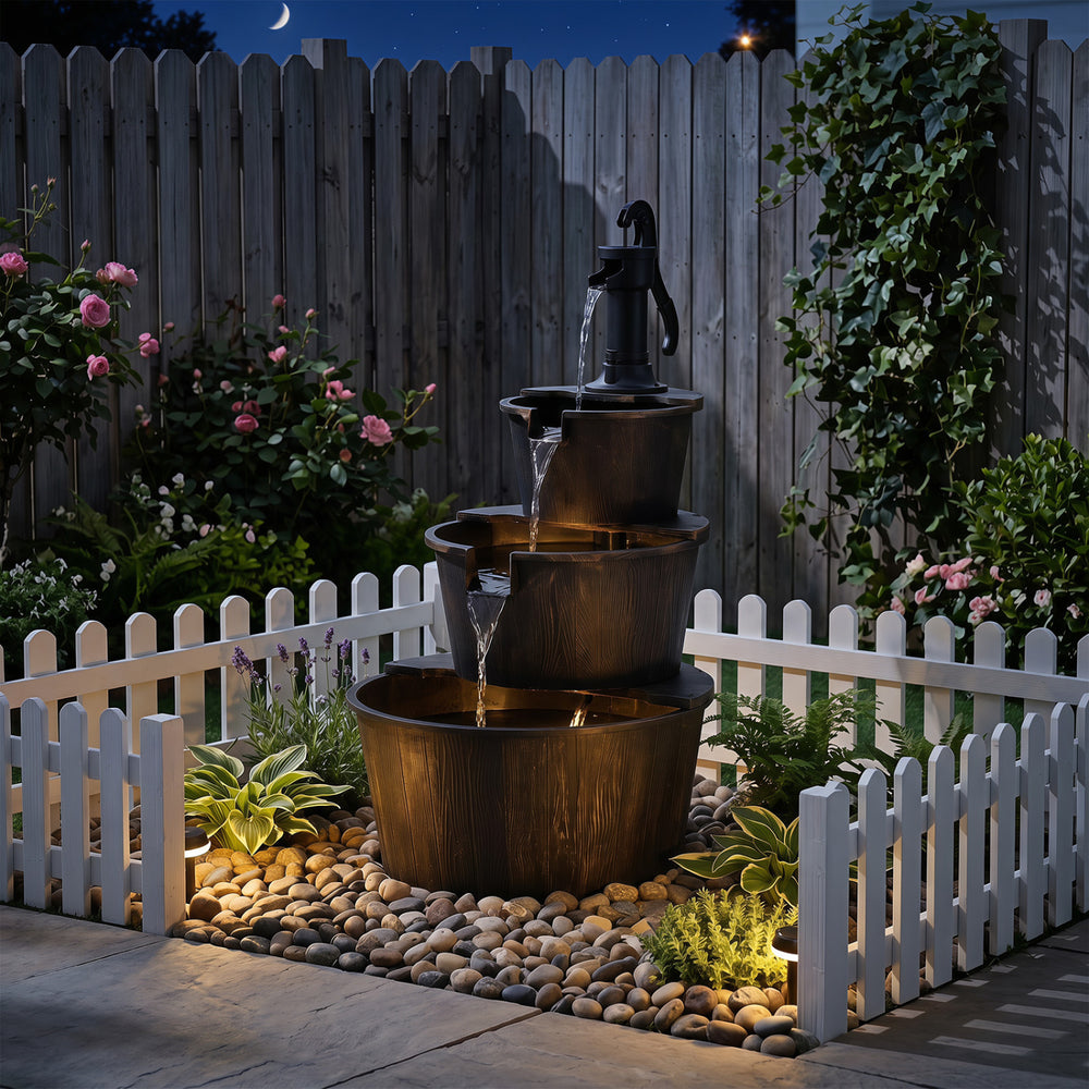 Three-tier outdoor barrel waterfall fountain with vintage bronze finish and electric pump for a relaxing garden ambiance.