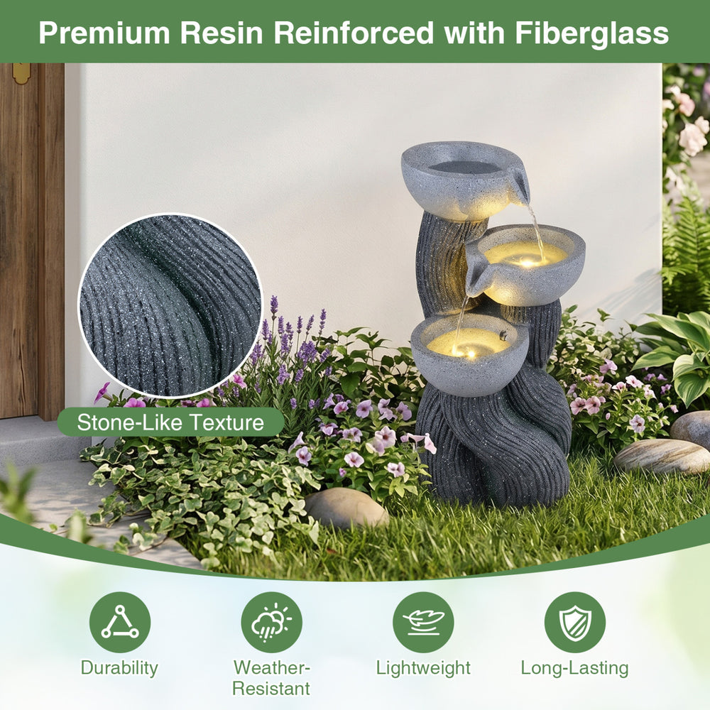 Three-tier outdoor water fountain with LED lights, made of resin and fiberglass, featuring a stone-like texture for.