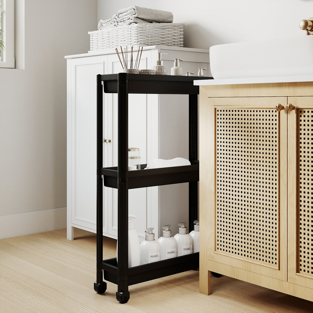 3-tier slim rolling storage cart in black with wheels, ideal for bathroom organization and compact spaces.
