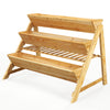 Three-tier wooden vertical raised garden bed with storage shelf, made of durable fir wood for outdoor use.