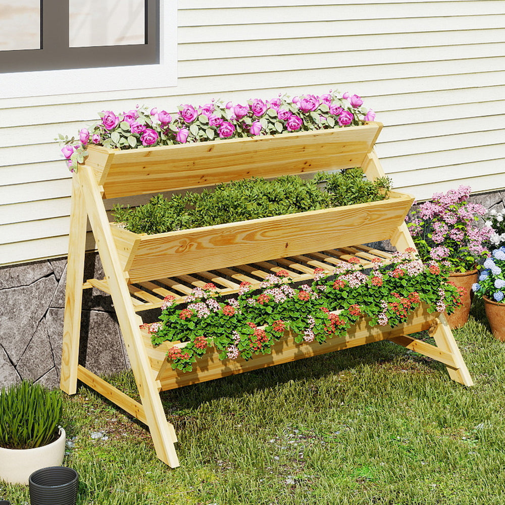 Three-tier wooden vertical raised garden bed with storage shelf, made of fir wood, ideal for flowers and herbs outdoors.