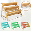 Three-tier wooden vertical raised garden bed with storage shelf, made of fir wood, ideal for flowers and vegetables.