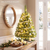 3 ft pre-lit artificial mini Christmas tree decorated with warm white LED lights, ideal for tabletops and cozy holiday settings.