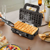 Waffle maker with non-stick plates, showcasing golden waffles, ideal for versatile cooking and easy cleaning.