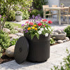 Black 3-in-1 outdoor umbrella base with water bag, designed for stability and easy outdoor organization.