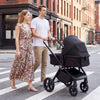 3-in-1 convertible bassinet stroller in black features a high landscape design for comfort and safety during outdoor walks.