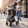 3-in-1 convertible high landscape bassinet stroller in black with adjustable backrest and ample storage for baby essentials.