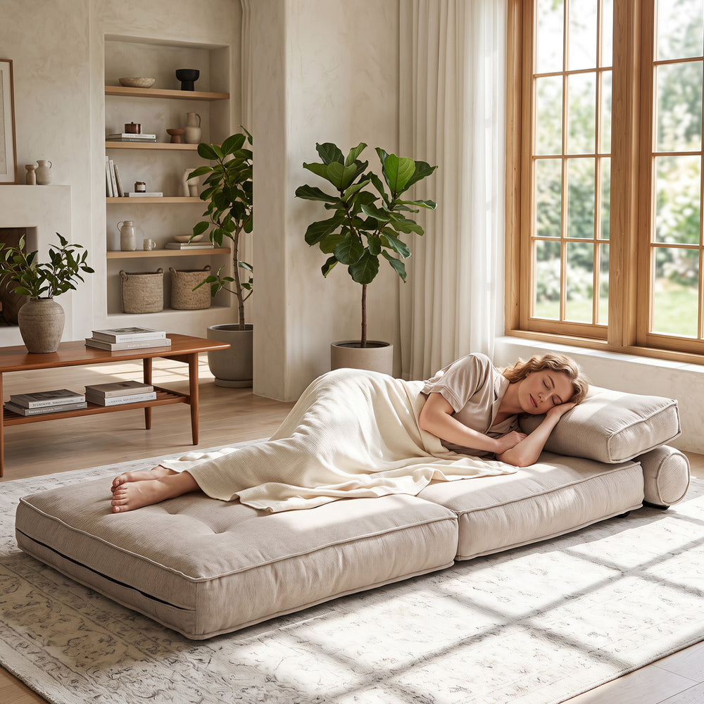 Beige 3-in-1 folding sofa with bolster, convertible to bed, ideal for living rooms or guest rooms.