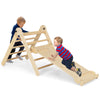 Kids play on a foldable 3-in-1 climbing set with a triangular ladder and adjustable ramp for safe indoor fun.