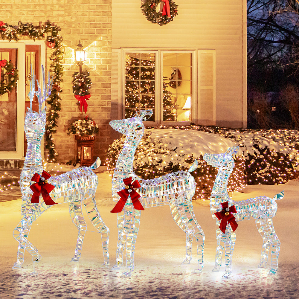 Lighted Christmas reindeer family with 230 LED lights, featuring a 5 ft buck, 4 ft doe, and 3 ft fawn for festive.