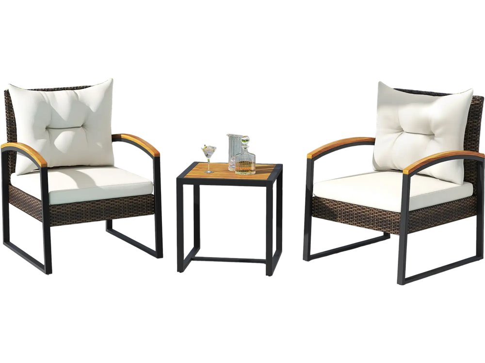 Two chairs with white cushions and acacia wood armrests, alongside a square table, perfect for poolside relaxation.