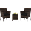 Two cushioned outdoor chairs with a square glass tabletop, made of durable rattan, perfect for poolside relaxation.