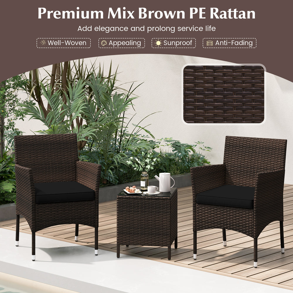 Outdoor conversation set featuring cushioned seats and a glass tabletop in premium mix brown PE rattan for backyard.