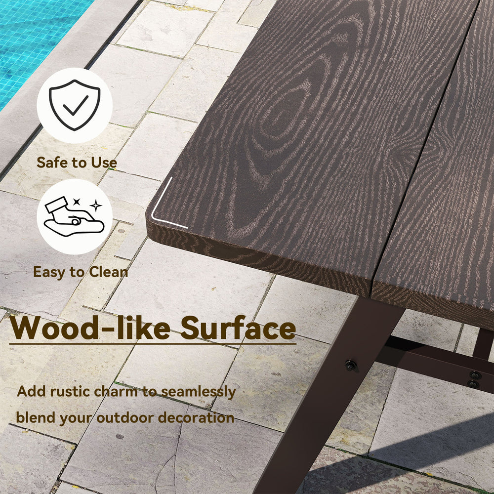 Close-up of the wood-like surface of the outdoor picnic table, showcasing its smooth finish and rounded corners for.