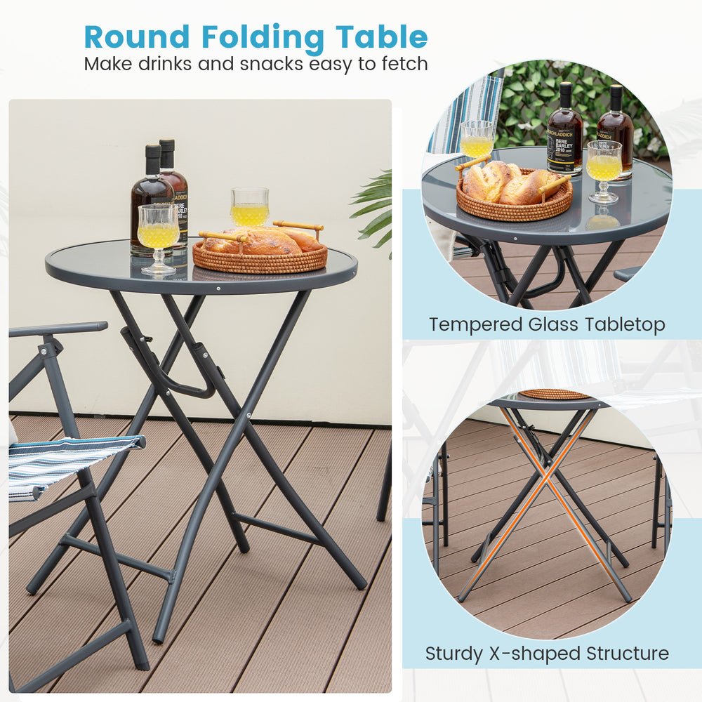 Round folding table with tempered glass tabletop and sturdy X-shaped structure, perfect for outdoor use.