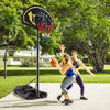 Portable adjustable basketball hoop system with a 41-inch backboard, suitable for all ages, set up outdoors.