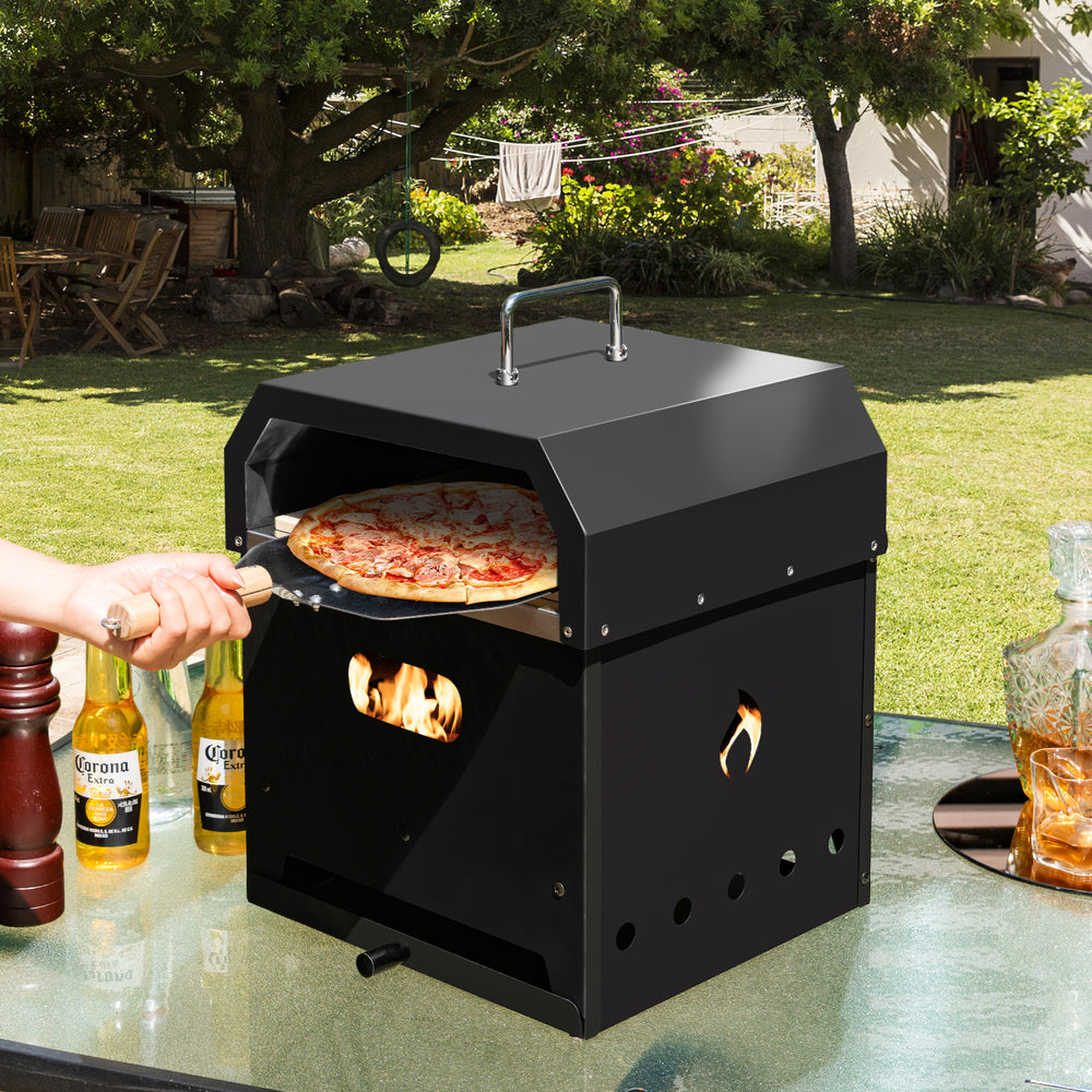 Portable 4-in-1 outdoor pizza oven with 12-inch pizza stone, made of stainless steel, ideal for BBQ and baking.