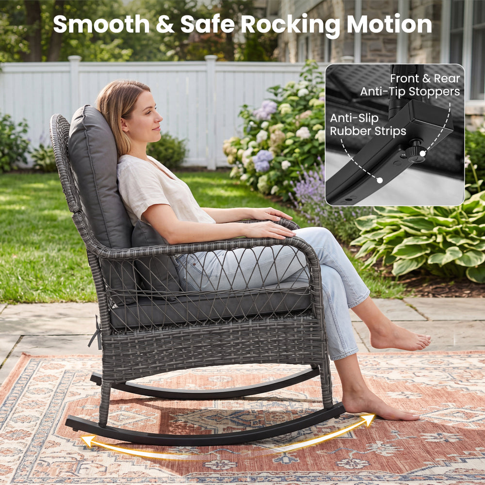 Gray patio rattan rocker chair features thick cushions, anti-tip stoppers, and a smooth rocking motion for outdoor comfort.