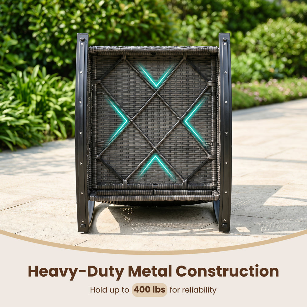 Heavy-duty patio rattan rocker chair with anti-tip stoppers, thick cushions, and a 400 lbs weight capacity for outdoor comfort.