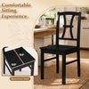 Black dining chair with a spacious seat and ergonomic backrest, perfect for kitchen or dining room use.