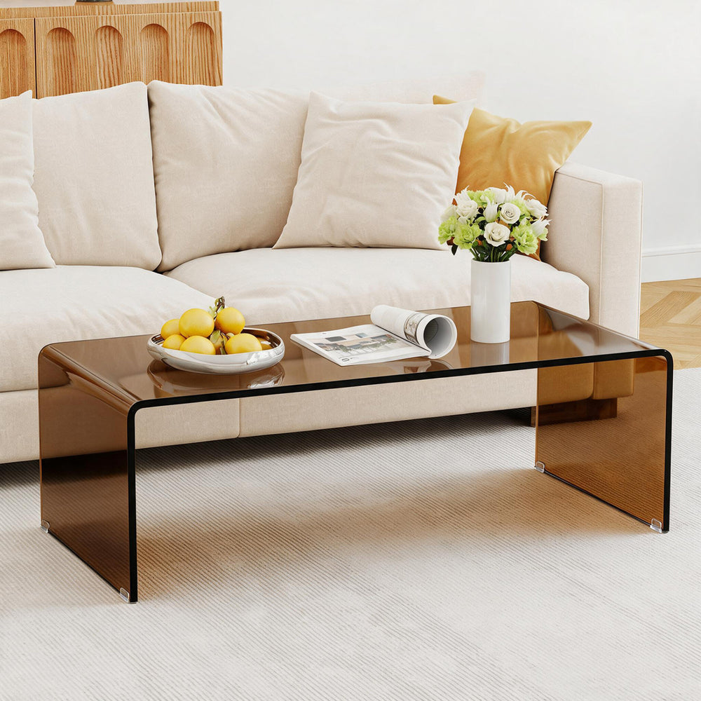 40-inch dark brown coffee table with a rounded tempered glass top, providing a stylish centerpiece for your living area.