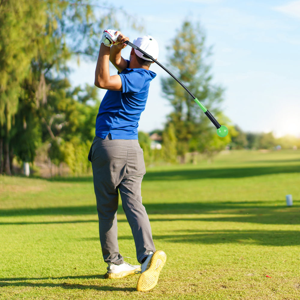 Golf swing trainer aid with weighted head, fiberglass shaft, and ergonomic handle for improving swing balance and.