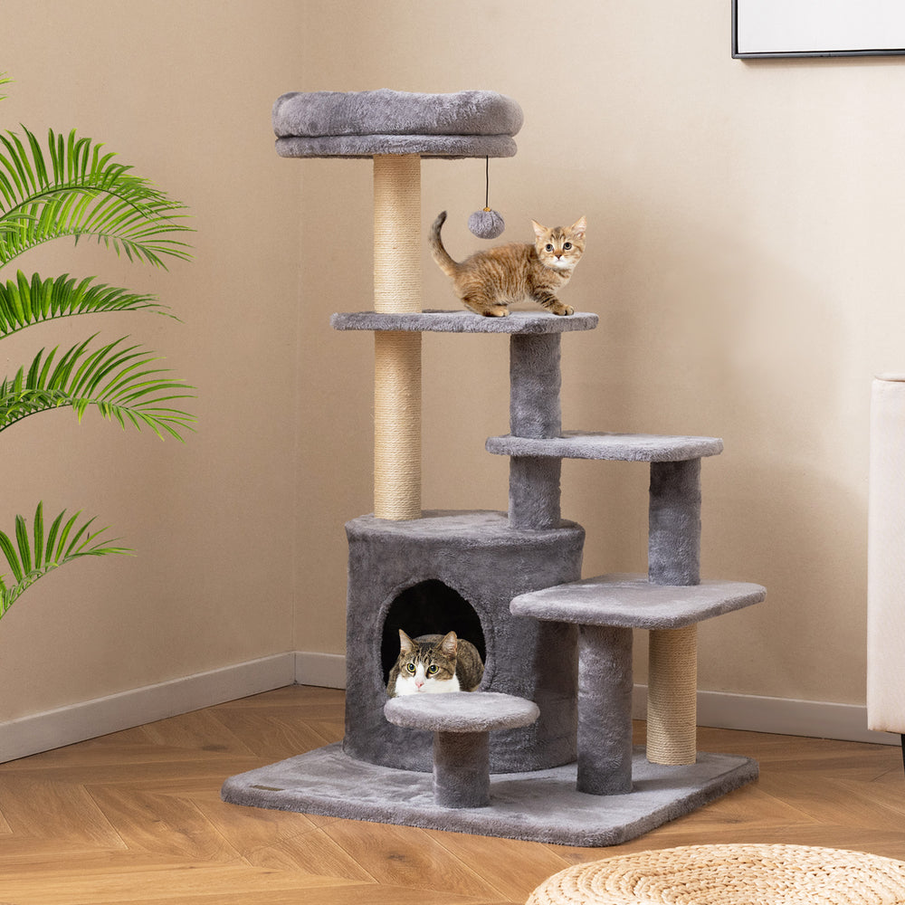 Gray multi-level cat tower with a cozy condo and dangling jingle ball, designed for playful cats and stability.