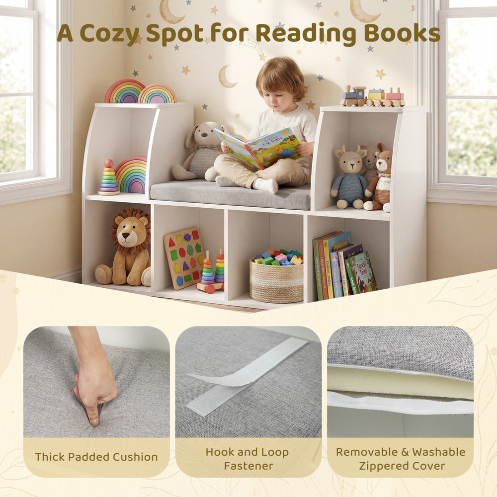Kids bookshelf with reading nook, featuring a thick padded cushion and 6 open cubes for books and toys in white.