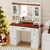 Makeup dressing table with lighted mirror, storage cabinets, and power outlets, perfect for bedrooms or studios.