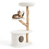 Cat enjoying the dangling ball on the 41-inch tall beige cat tower, featuring real wood branches and cozy lounging spots.