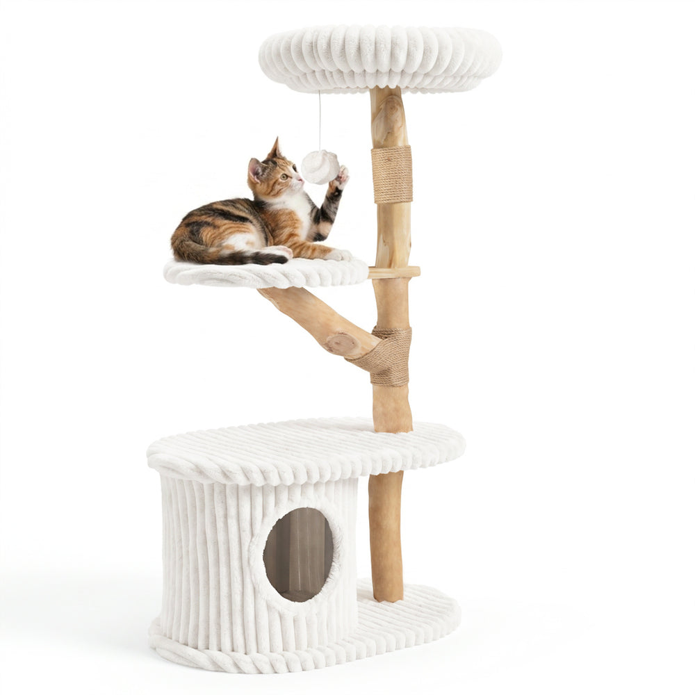 Cat enjoying the dangling ball on the 41-inch tall beige cat tower, featuring real wood branches and cozy lounging spots.